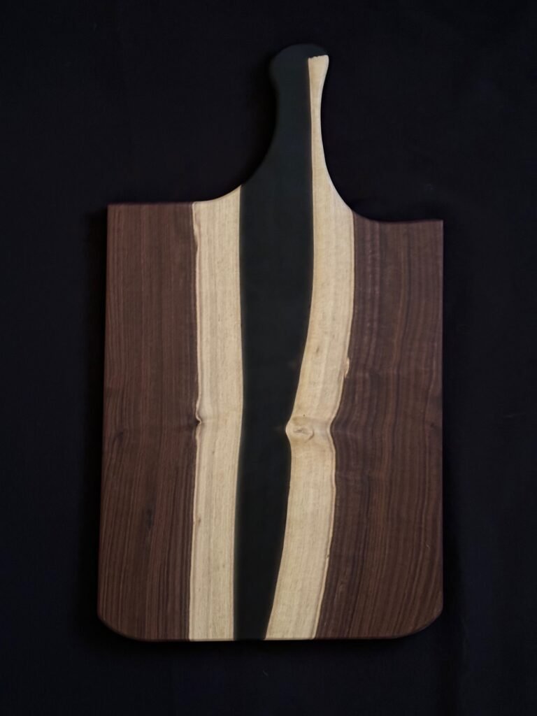 Walnut wooden charcuterie board with black resin